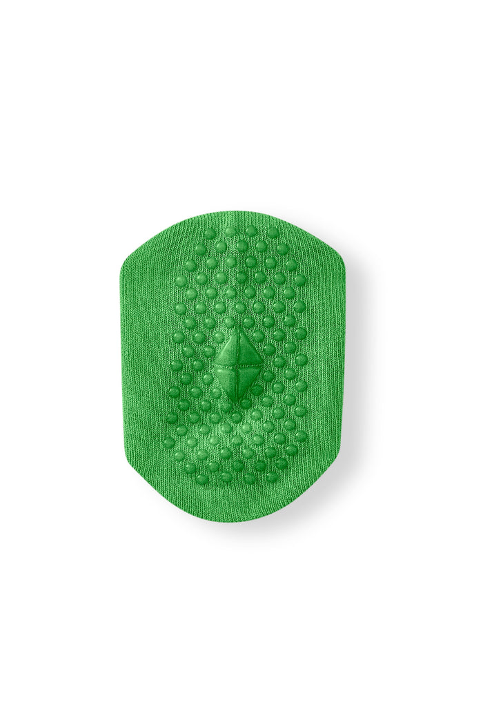Quarter Socks in Chive with grips shown on a white background