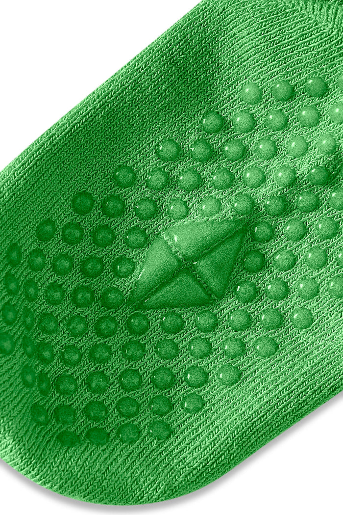 Close up of Quarter Socks in Chive with grips shown on a white background