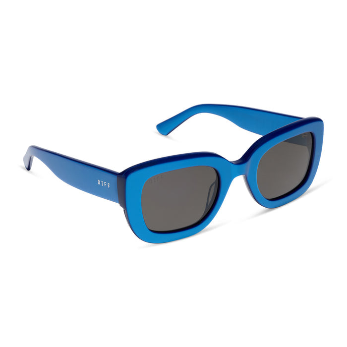 diff eyewear romy square sunglasses with a luminous blue acetate frame and grey lenses angled view