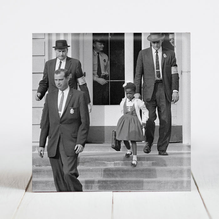 Ruby Bridges Ruby Bridges escorted by US Marshalls at school, New Orleans c.1960