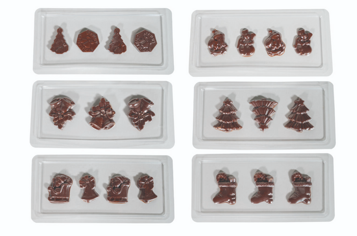 Das Unold Schokoladenform-Set Weihnachten umfasst sechs durchsichtige Schalen, die jeweils vier festliche Schokoladenformen – Weihnachtsbäume, Strümpfe, Weihnachtsmänner, Engel und Teddybären – auf weißem Hintergrund formen.