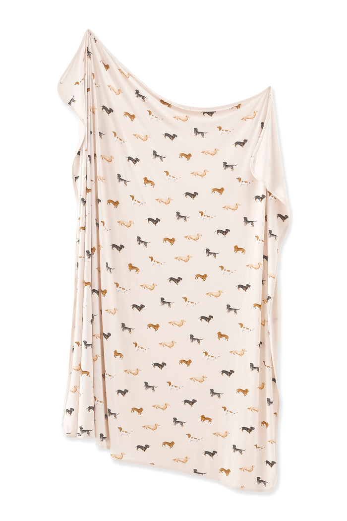 Beige Swaddle Blanket in Dachshund print on white background