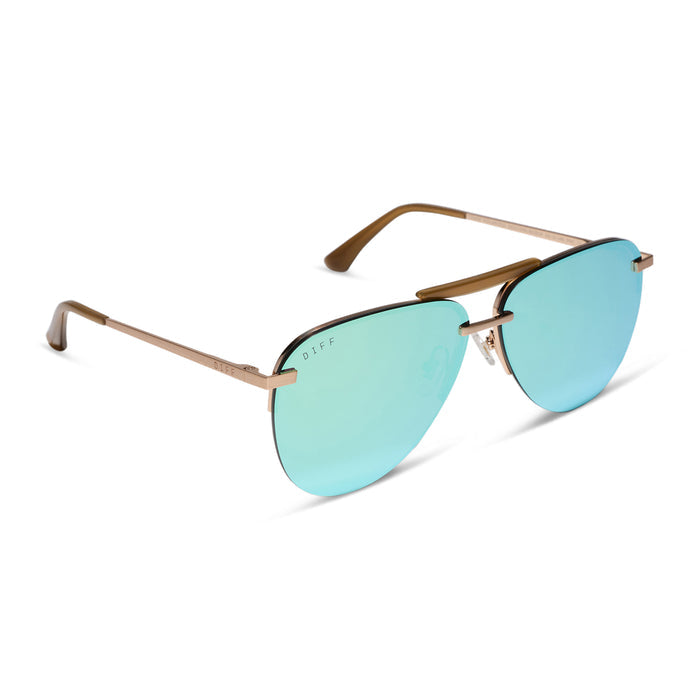 diff eyewear tahoe oversized aviator sunglasses with a gold metal frame and dew drop blue mirror polarized angled view