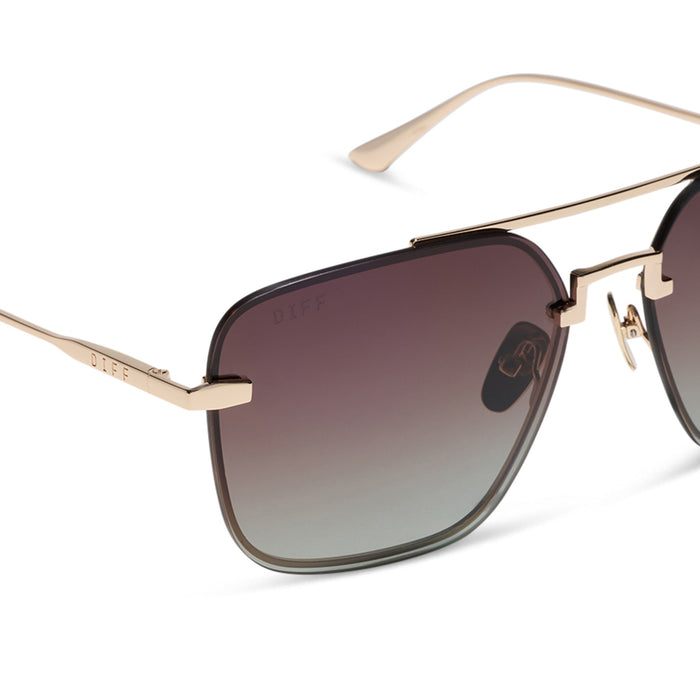 diff eyewear teddy oversized navigator sunglasses with a gold metal frame and brown gradient polarized lenses detailed view