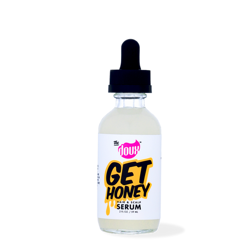 A bottle of The Doux Get Honey Hair & Scalp Serum with a dropper cap.
