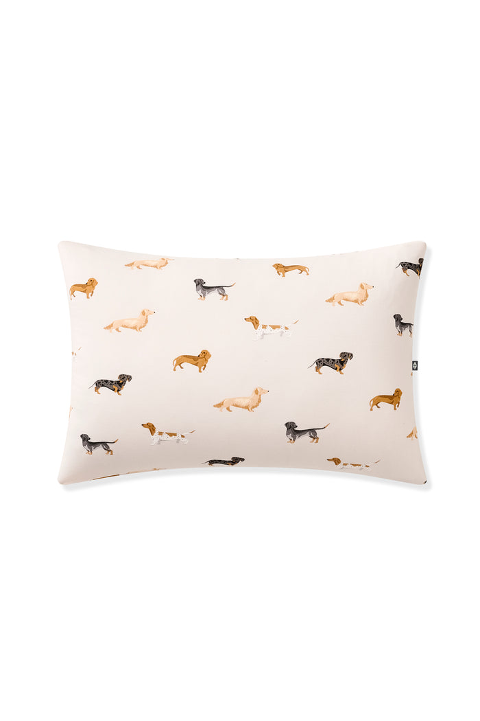 Beige Toddler Pillowcase with Dachshund print on a white background