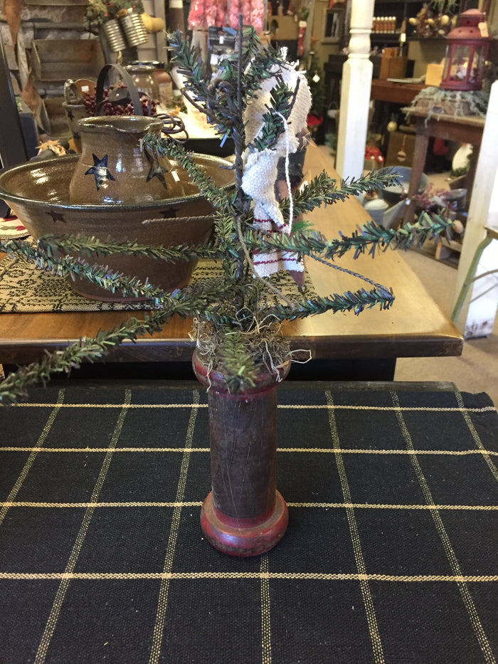 Tree On Wooden Spool