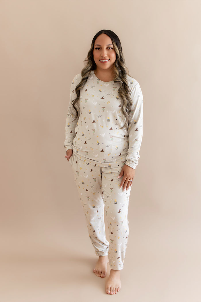 Women wearing a cream joggers set with Harry Potter prints on a beige background