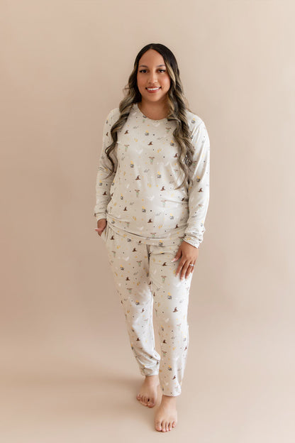 Women wearing a cream joggers set with Harry Potter prints on a beige background