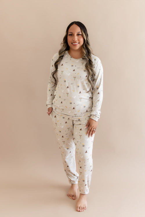 Women wearing a cream joggers set with Harry Potter prints on a beige background