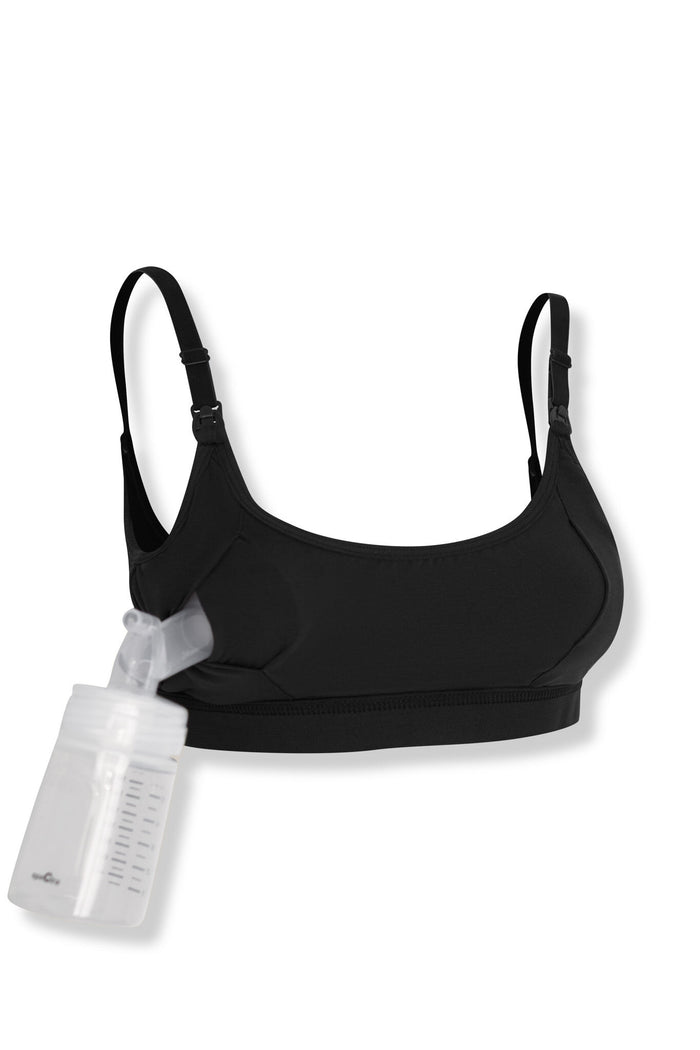 Clear pumping bottle attached to a black pumping bra