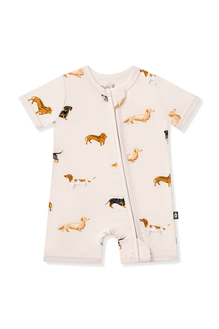 Beige Zipper Shortall Romper in Dachshund print on a white background