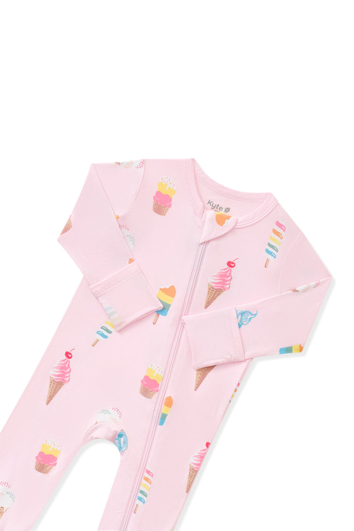 Top part of Pink Zippered Romper in Ice Cream print on white background